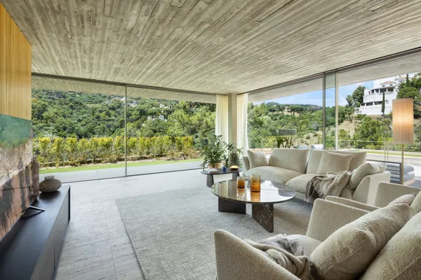 Spectacular design villa that blends with nature, offering expansive sea views in Benahavís