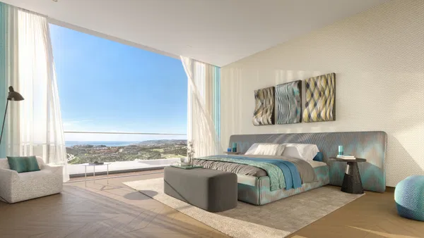 Spacious branded penthouse with private terrace, sea and golf views in Finca Cortesín, Casares