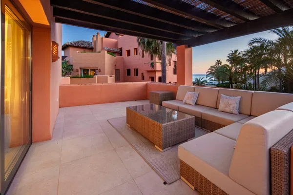 A beachfront penthouse designed around privacy and mediterranean living in La Morera, Marbella East