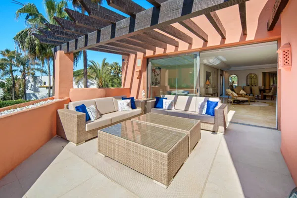 A beachfront penthouse designed around privacy and mediterranean living in La Morera, Marbella East