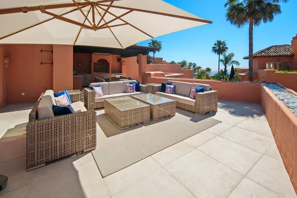 A beachfront penthouse designed around privacy and mediterranean living in La Morera, Marbella East