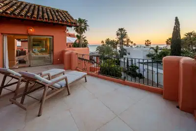 A beachfront penthouse designed around privacy and mediterranean living in La Morera, Marbella East