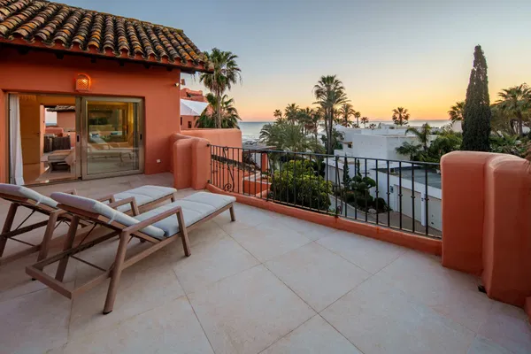 A beachfront penthouse designed around privacy and mediterranean living in La Morera, Marbella East