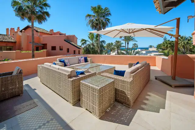 A beachfront penthouse designed around privacy and mediterranean living in La Morera, Marbella East