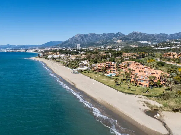 A beachfront penthouse designed around privacy and mediterranean living in La Morera, Marbella East