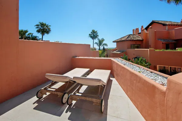 A beachfront penthouse designed around privacy and mediterranean living in La Morera, Marbella East