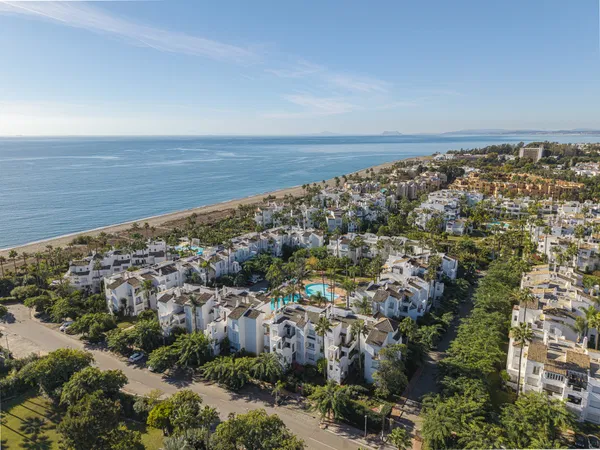 Beachfront contemporary apartment with refined Mediterranean living in Estepona, New Golden Mile