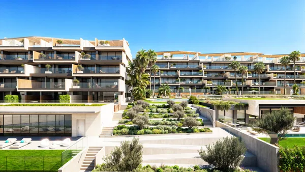 Sophisticated Ground Floor Beachfront Apartment with Private Garden in Manilva