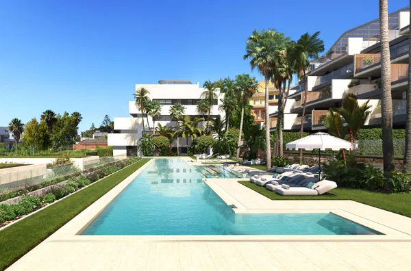 Sophisticated Ground Floor Beachfront Apartment with Private Garden in Manilva