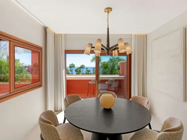 Refined beachfront duplex penthouse with Andalusian elegance, New Golden Mile, Estepona