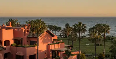 Refined beachfront duplex penthouse with Andalusian elegance, New Golden Mile, Estepona