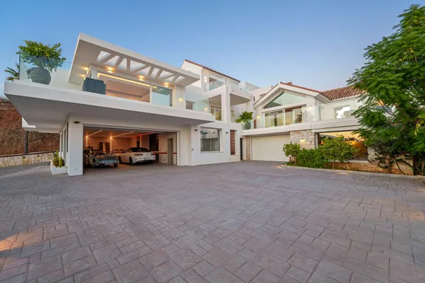 Spacious contemporary villa with guest house in a private hillside setting, Puerto del Almendro, Benahavís