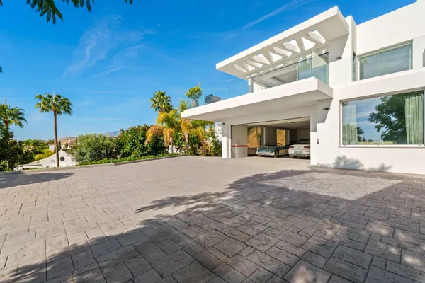 Spacious contemporary villa with guest house in a private hillside setting, Puerto del Almendro, Benahavís