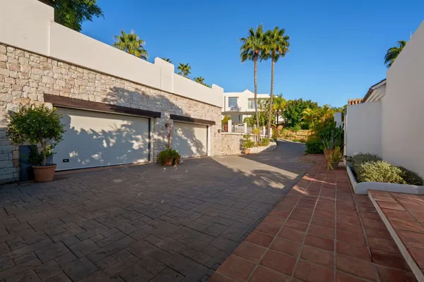 Spacious contemporary villa with guest house in a private hillside setting, Puerto del Almendro, Benahavís